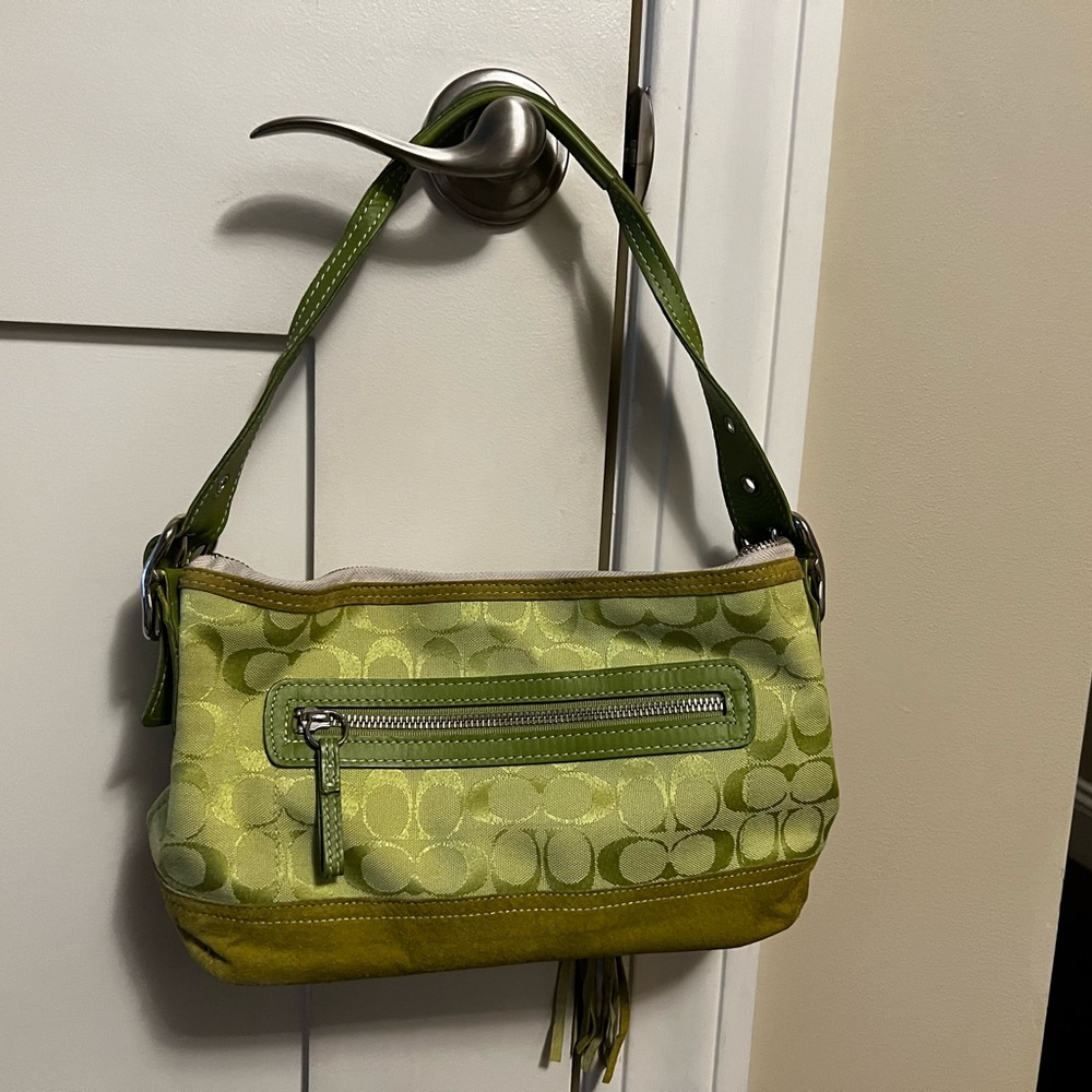 Coach lime green shoulder bag. Leather, suede and material. Zipped front pocket.